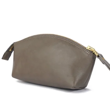 естествена кожа Дамска чанта за съединител Мода Женски цип чанта Комедийна чанта Грим чанта Истинска кожена чанта Нова