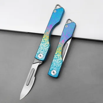 Цветен сгъваем нож от титанова сплав може да замени остриетата скалпел на открито оцеляване къмпинг EDC инструмент ключодържател джобен нож подарък